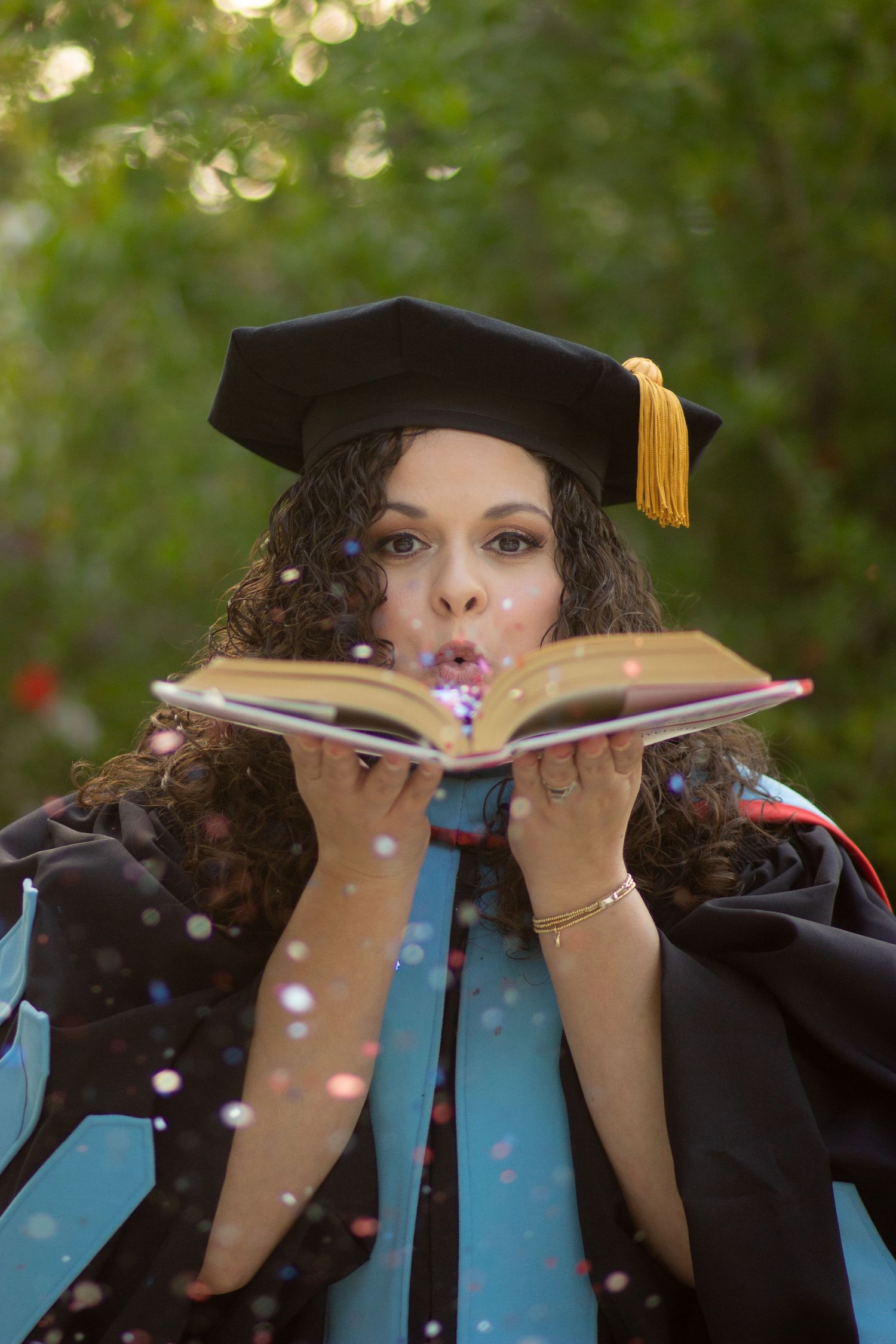 Graduation photoshoot shot at CSUN, California State University of Northridge. Female graduate photographed with style and intent.
