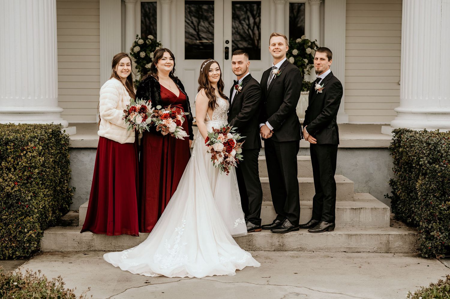 Bridal Party standing on the front steps of the Moore Mansion in Pasco, WA.