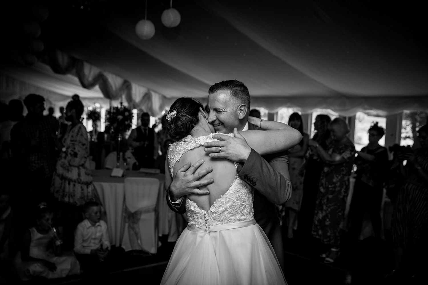 Bride & Groom laughing doing their first dance at The Old School House