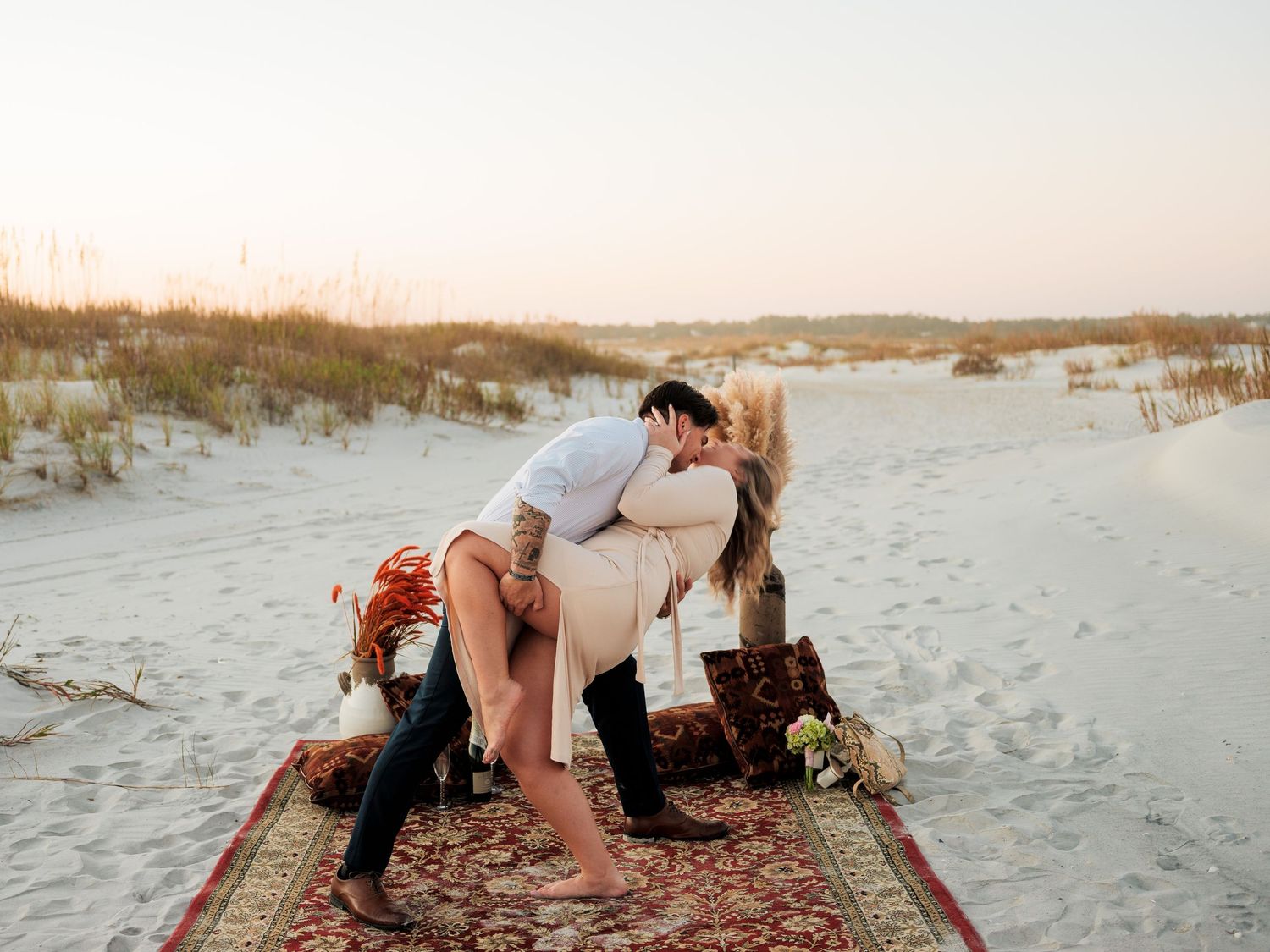 couples propose on the beach