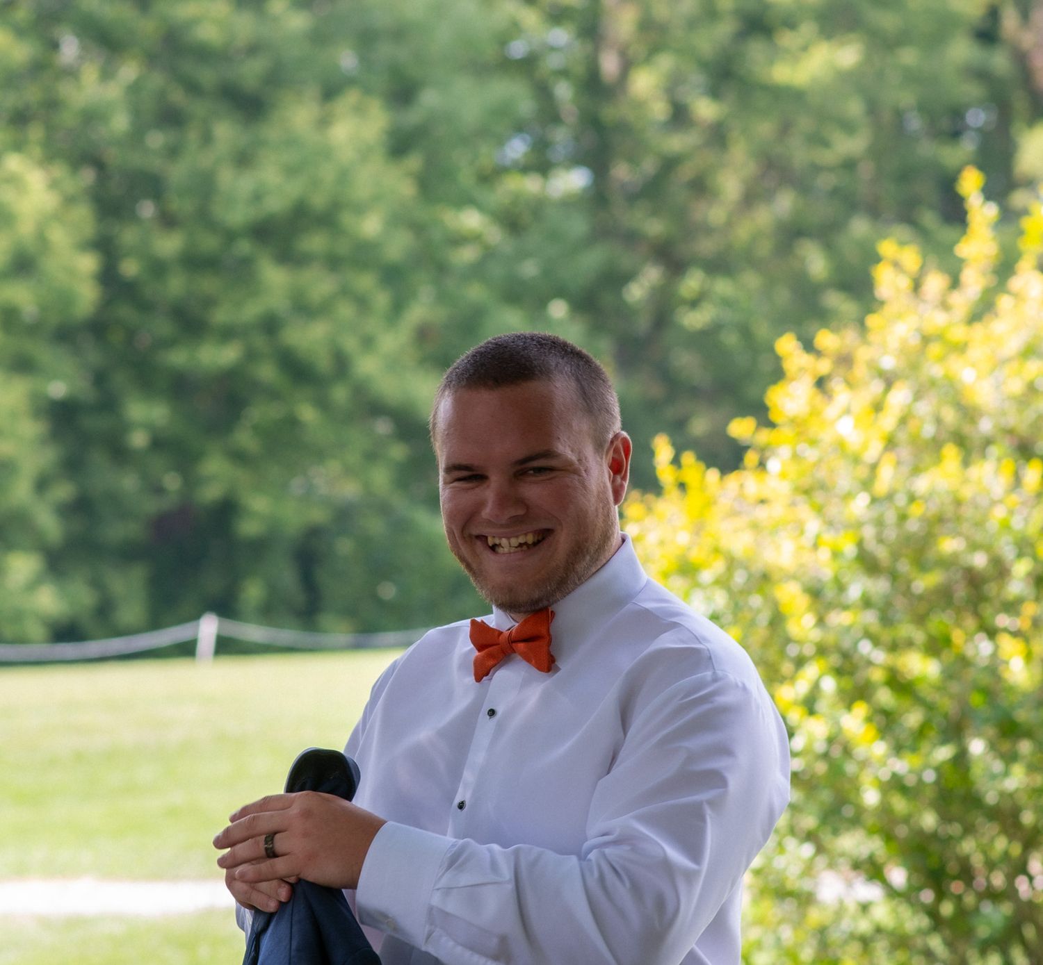 The groom is ready to walk down the aisle and celebrate!