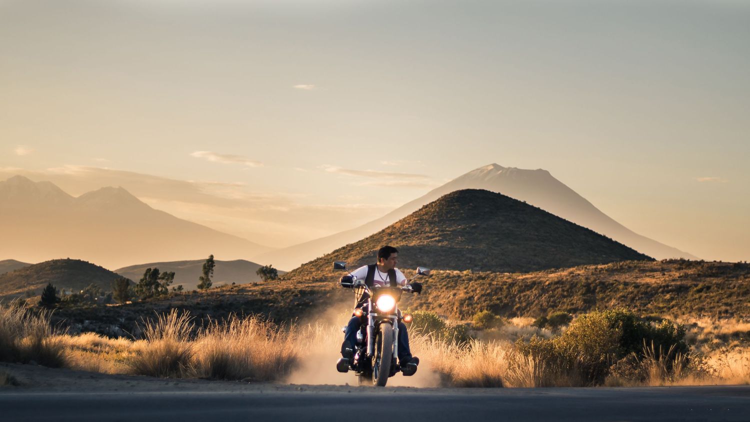 Motorcyclist, Chachani and Misti volcano