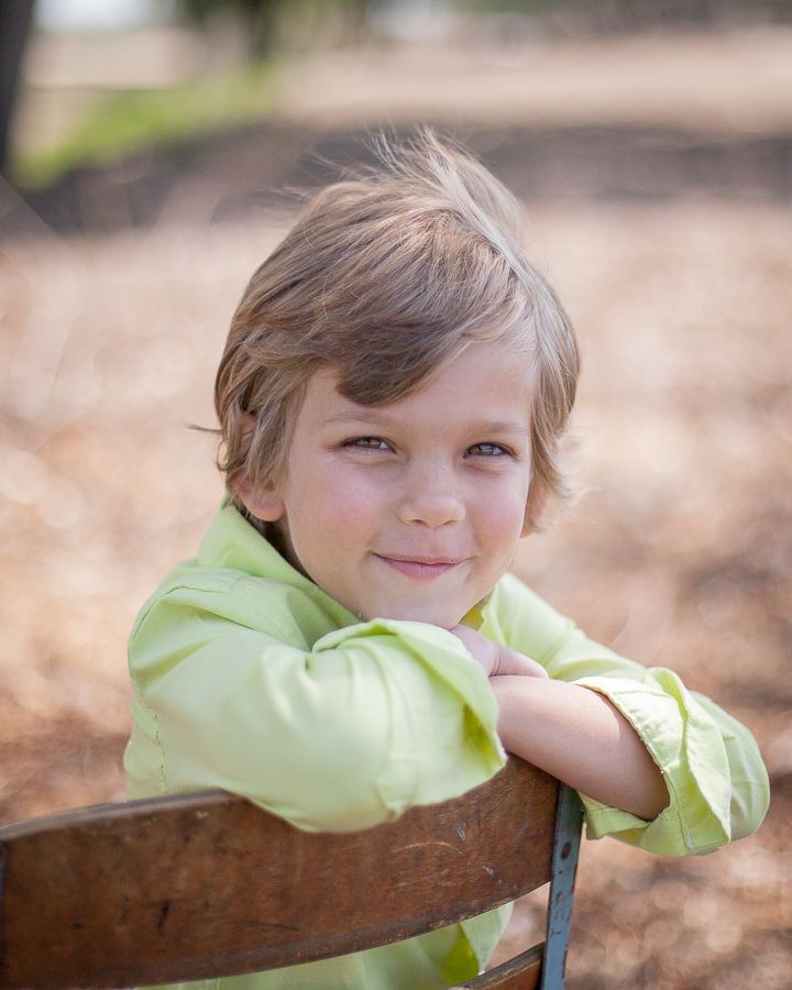 Series of photos showing someone in a light green shirt resting on a wooden surface.