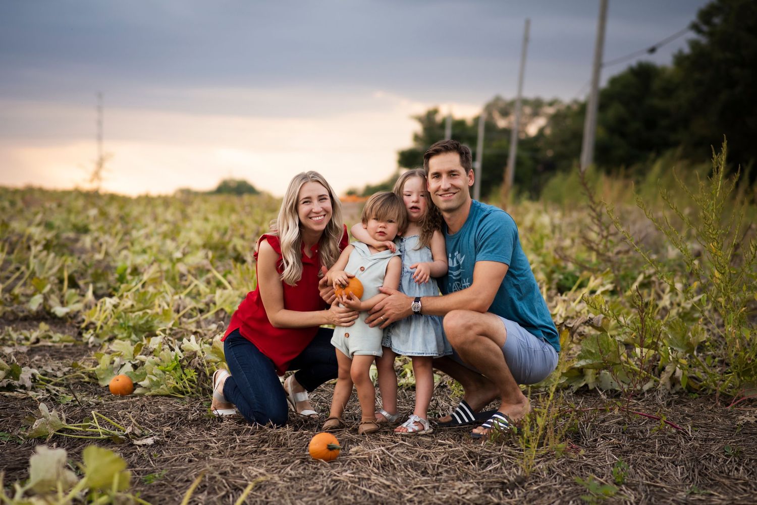 family pumpkin farm sunset fall down syndrome children photo