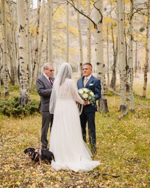 intimate elopement in salida colorado during peak fall. couple surrounded by aspens