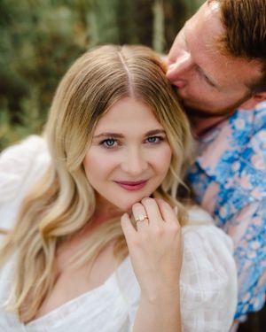 Close-up engagement photos in natural lighting showing ring detail.
