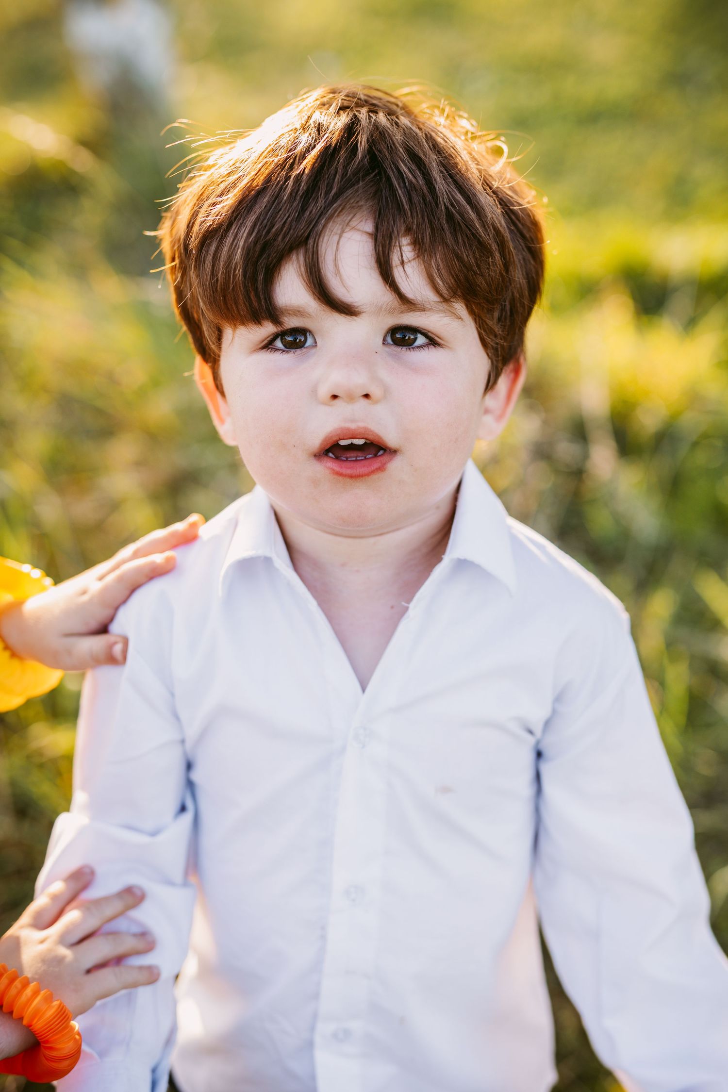 Cute boy guest at Stone Barn wedding venue