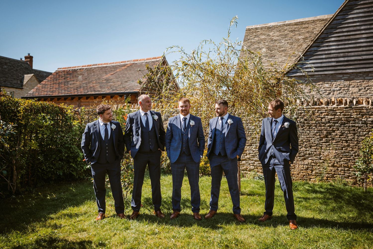 Groom and Groomsmen in garden before heading off to the ceremony