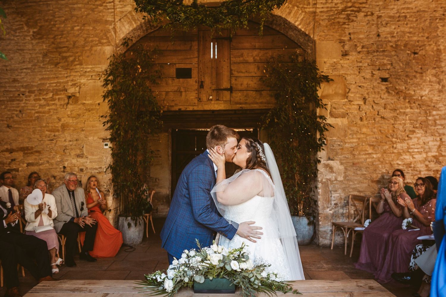First kiss Stone Barn Wedding Venue Cheltenham The Cotswolds