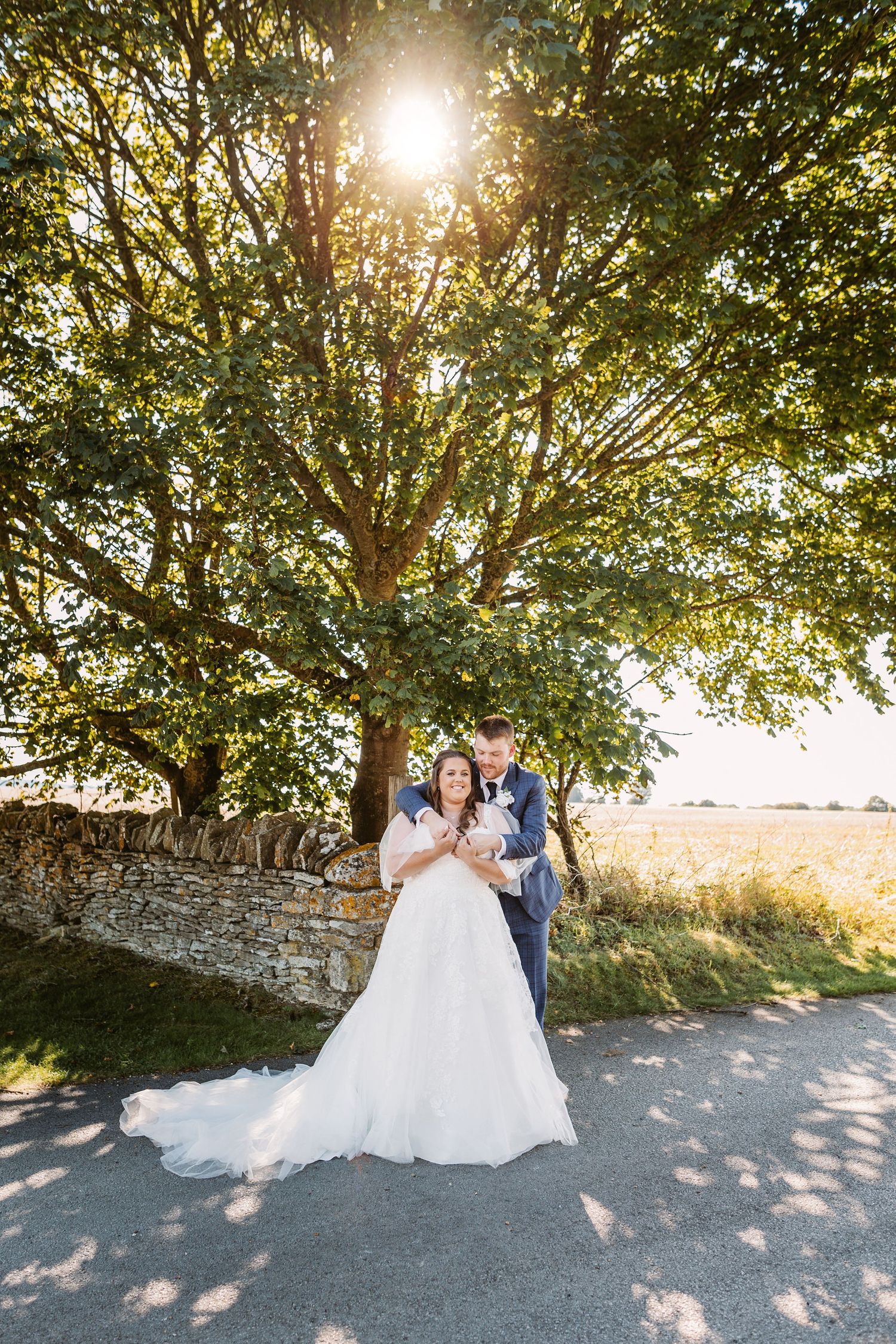 Bride and Groom portrait of beautiful couple embracing at Stone Barn wedding venue