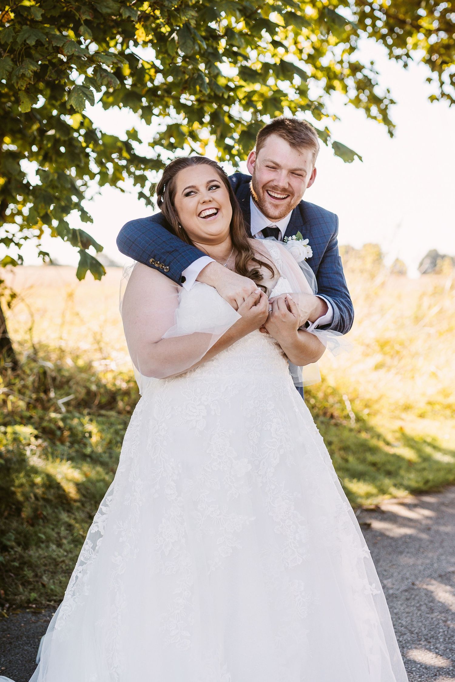 Bride and Groom portrait of beautiful couple kissing at Stone Barn wedding venue
