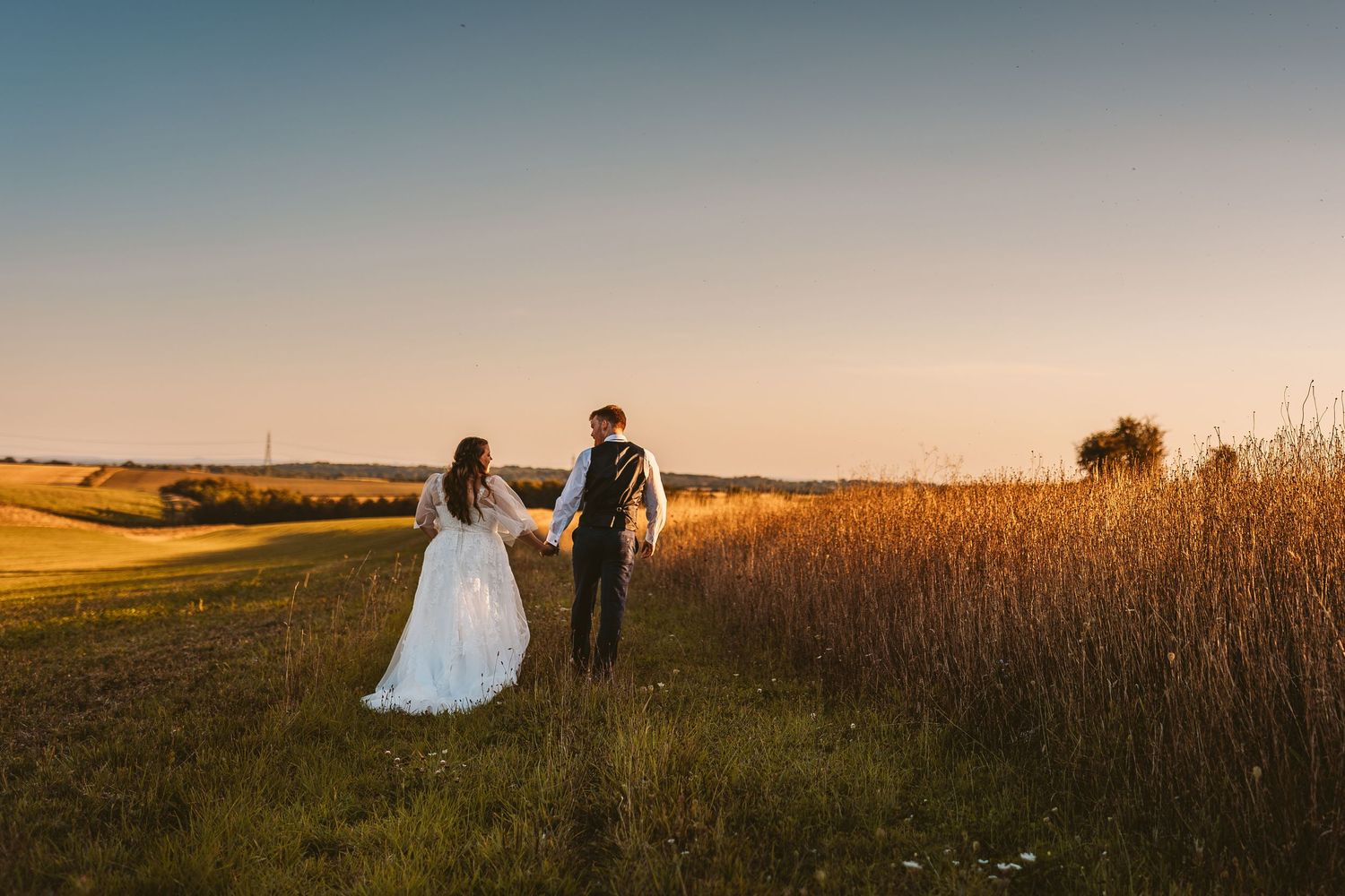 magical Bride and Groom golden hour sunset Stone Barn The Cotswolds looks like film painting