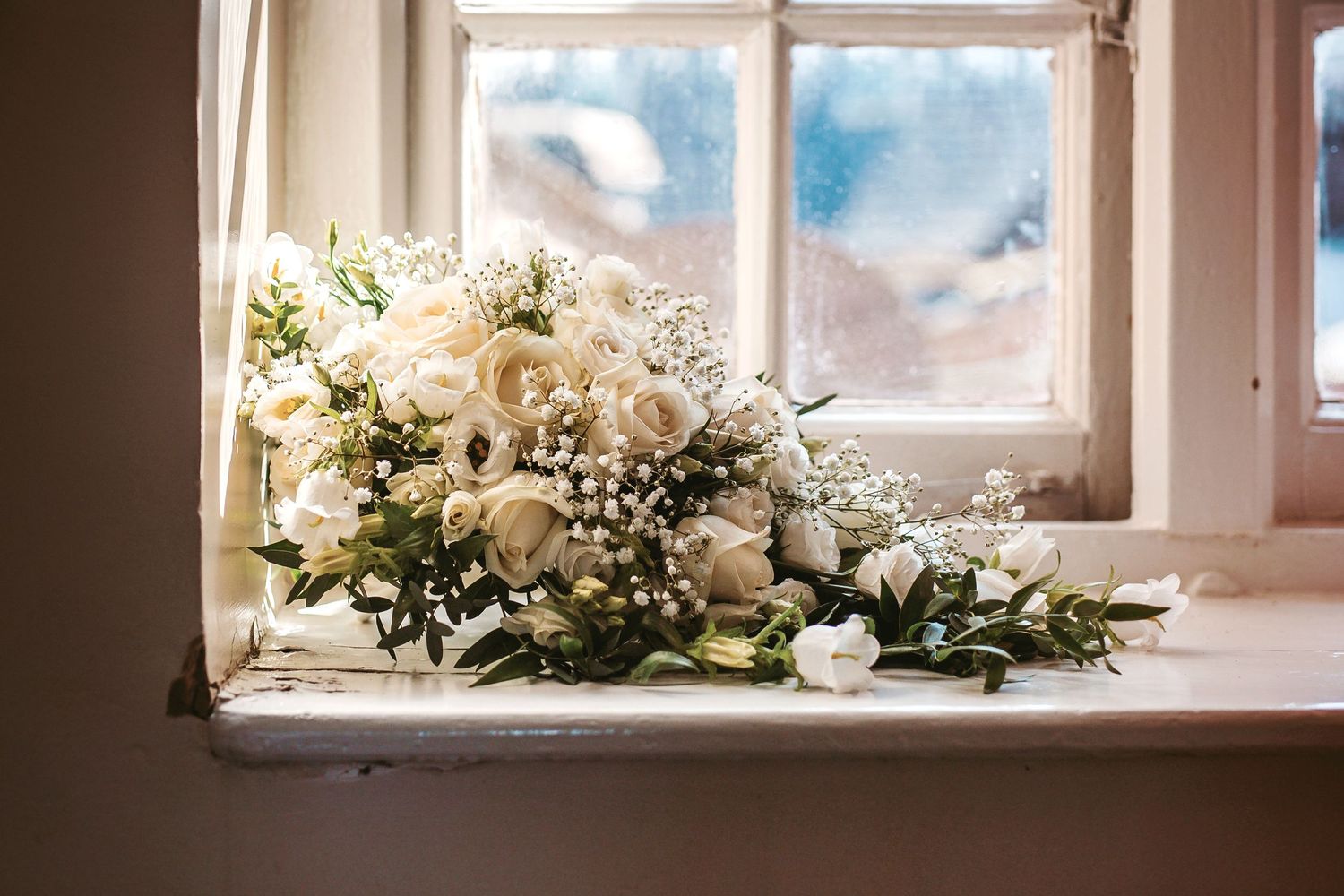 Brides bouquet whites and greens