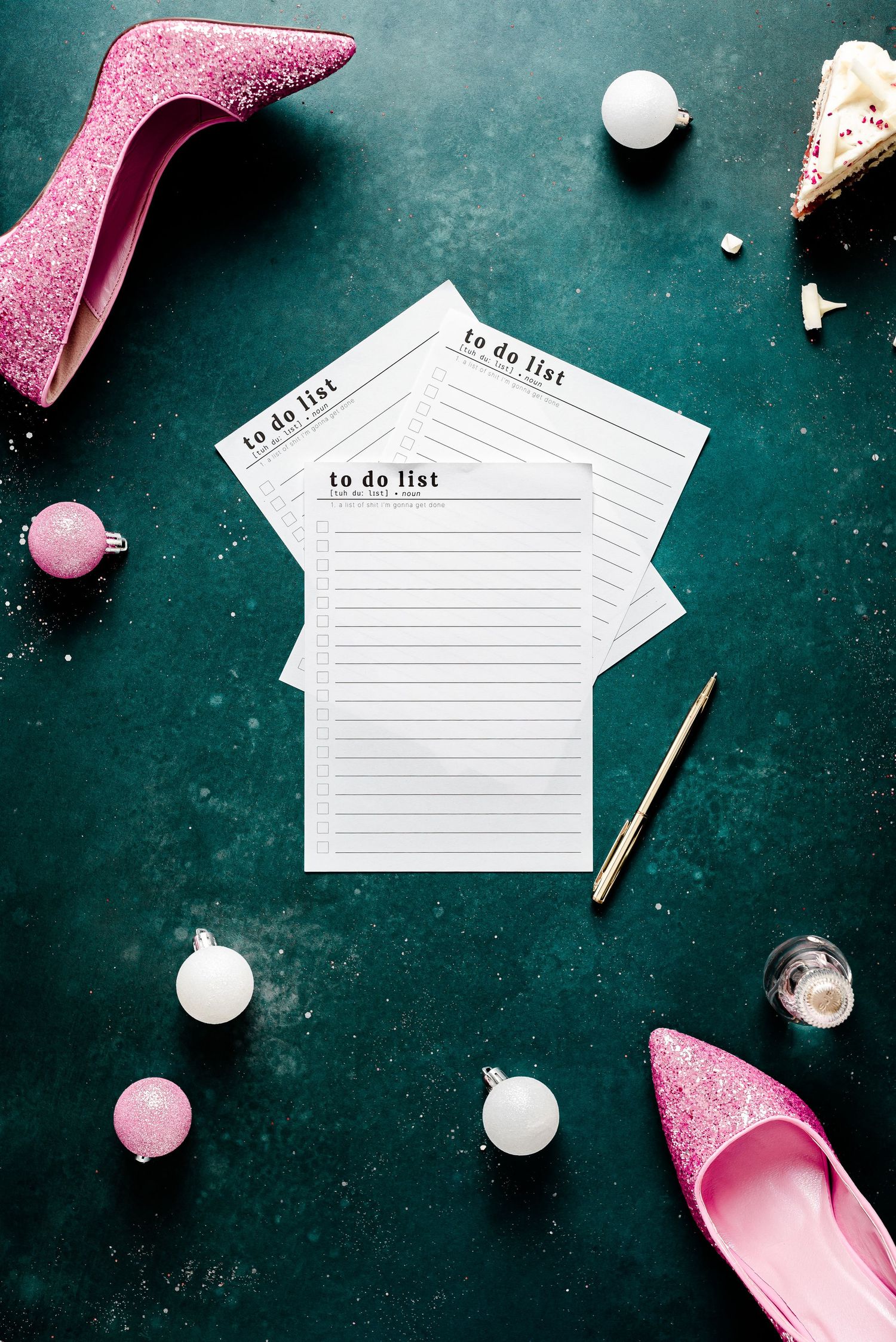 to do list notepaper on a sparkly green backdrop with pink high-heeled shoes and baubles dotted around, party planning