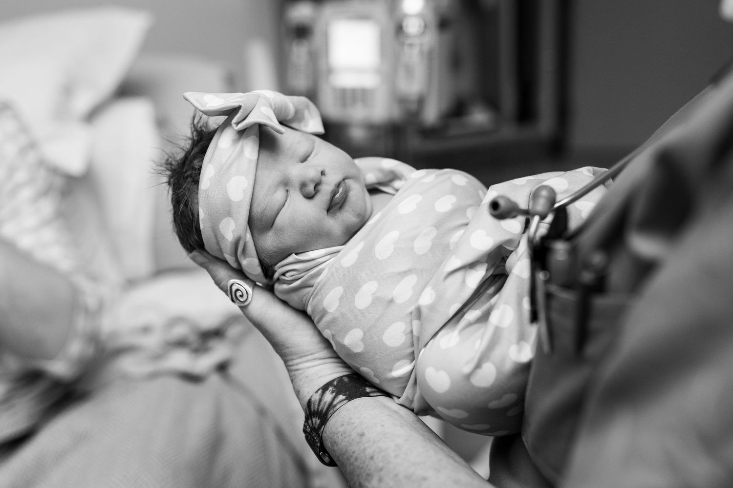 A swaddled newborn shortly after birth in Louisville, CO