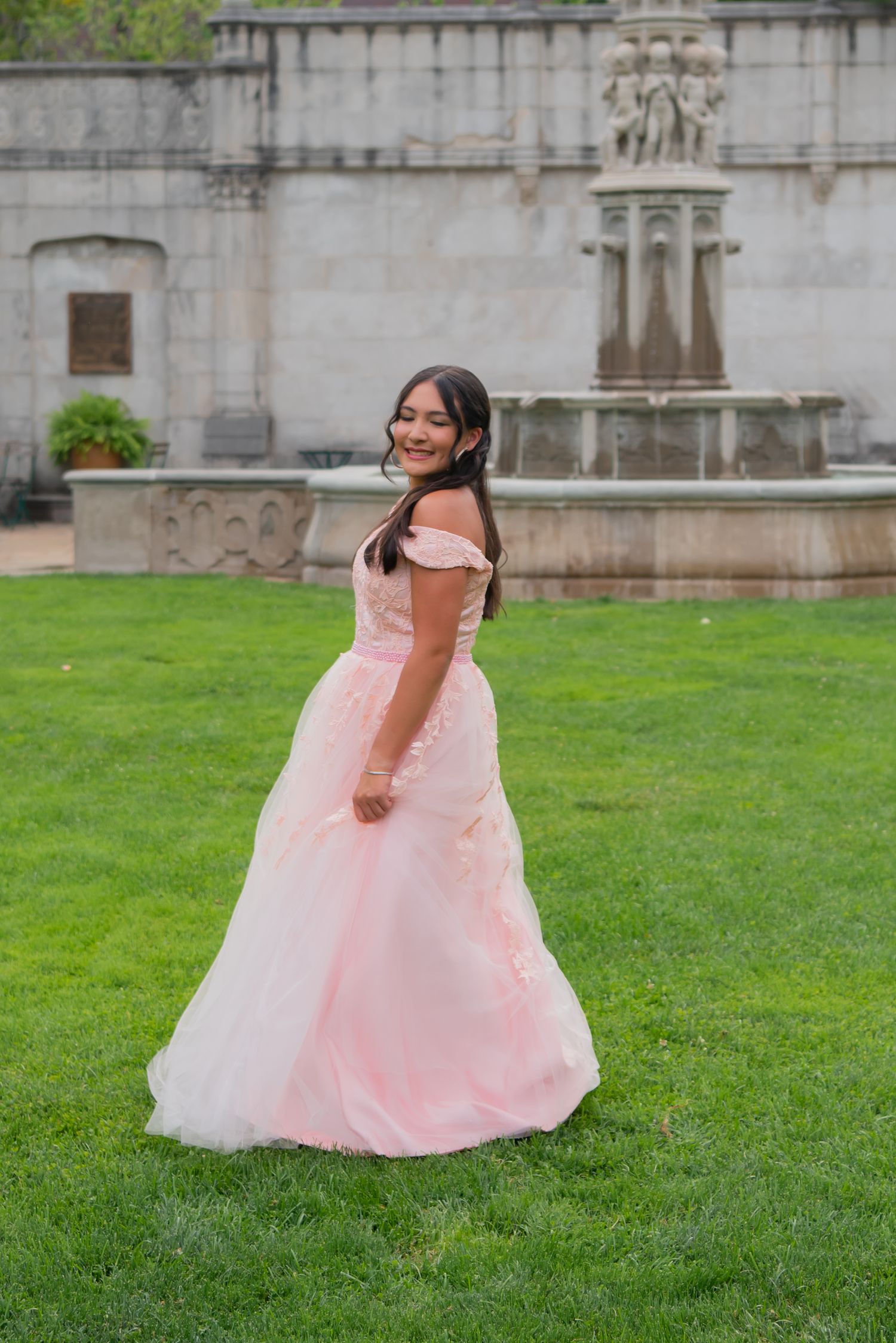 girl in pink gown at mellon park in summer