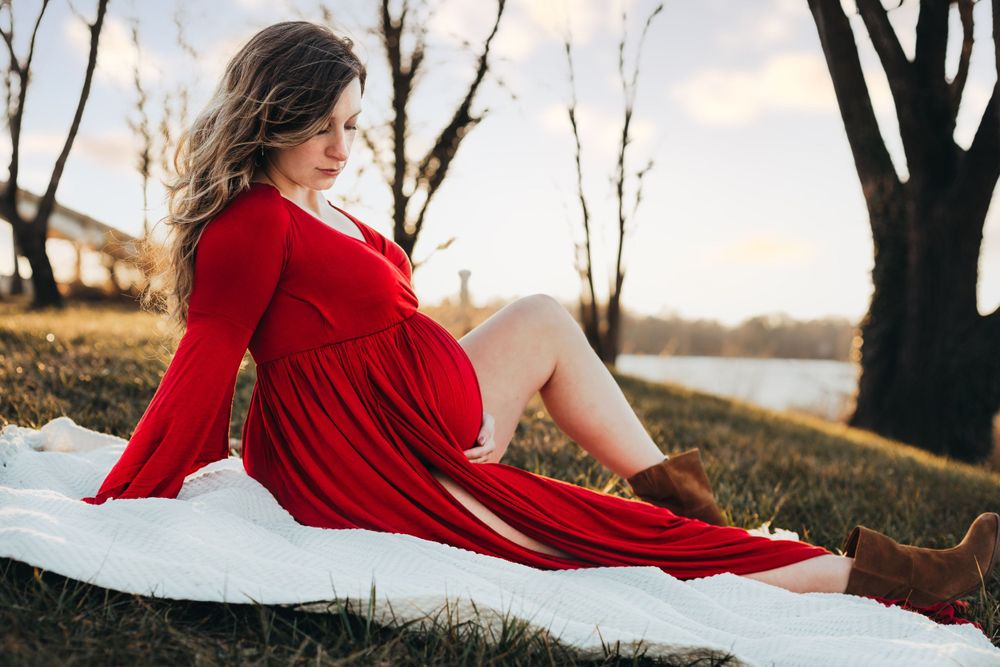 beautiful maternity photo in red dress