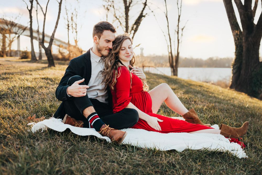 Maternity photo in red dress at Jonas Green Park. Annapolis maternity photographer. Annapolis family photographer