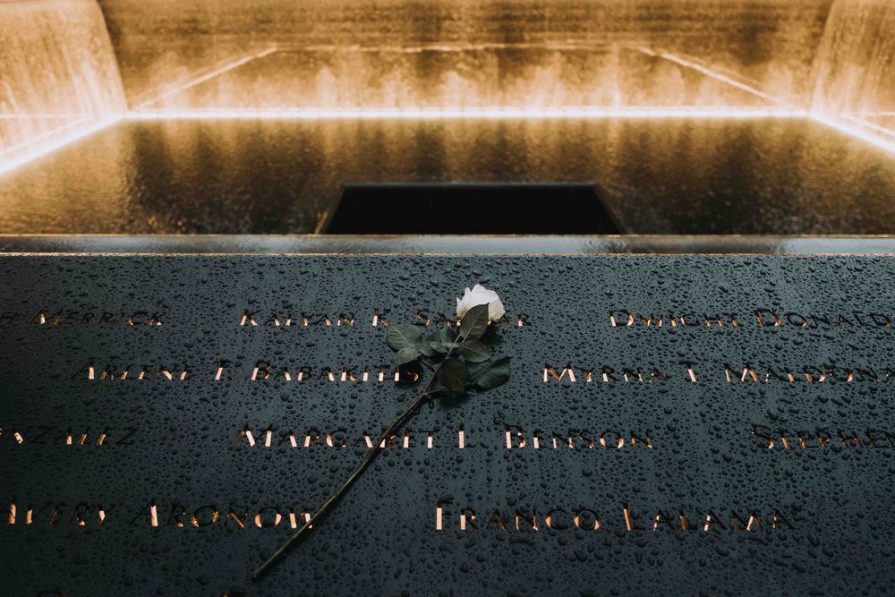 new York memorial 911 site zero anniversary water white rose dead