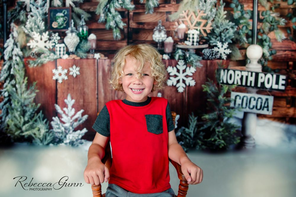 Christmas cocoa studio session with young boy in tulsa oklahoma; with snowflakes