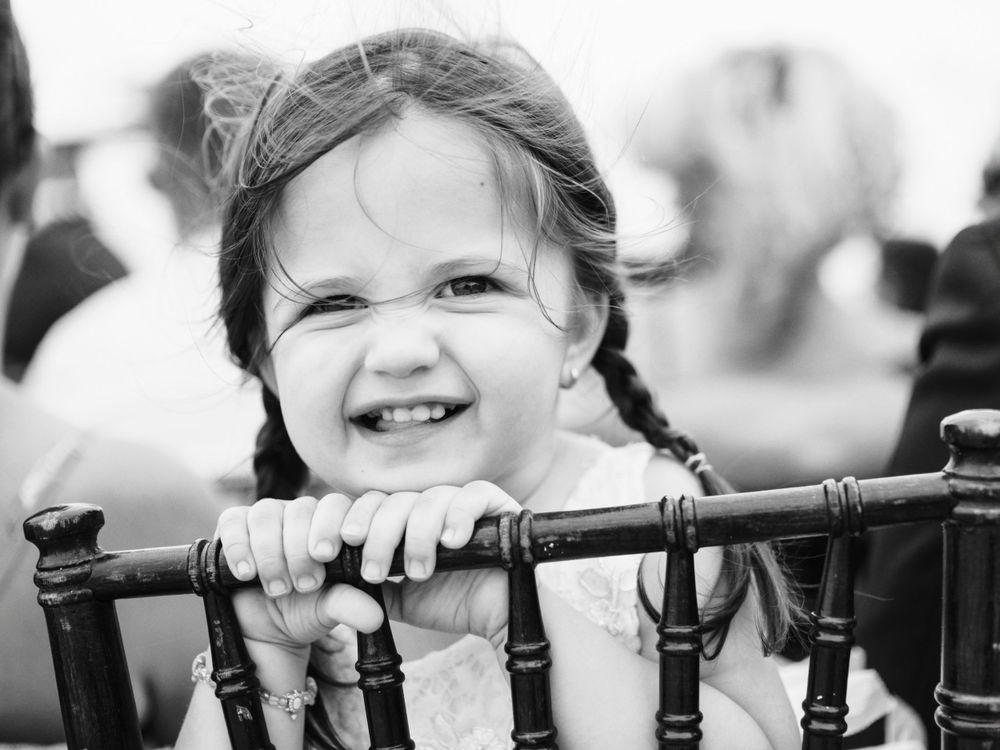 Close up black and white portrait at wedding celebration.