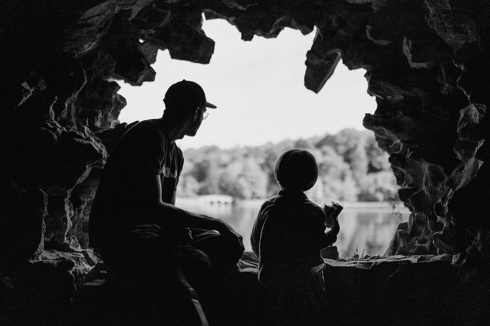 Southeast London Wedding and family photographer. Father and son looking out onto a lake