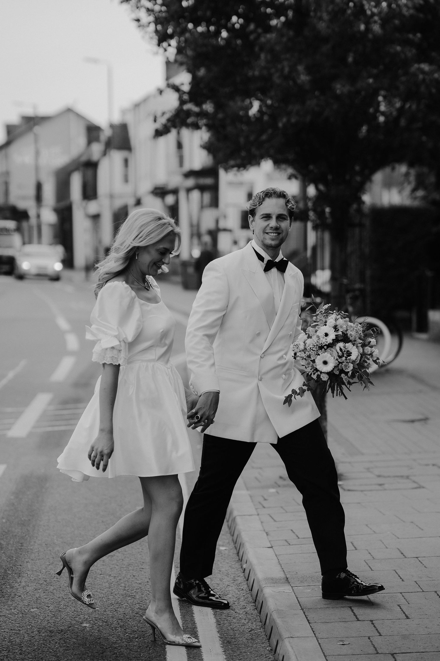 bride and groom walking in Oxford