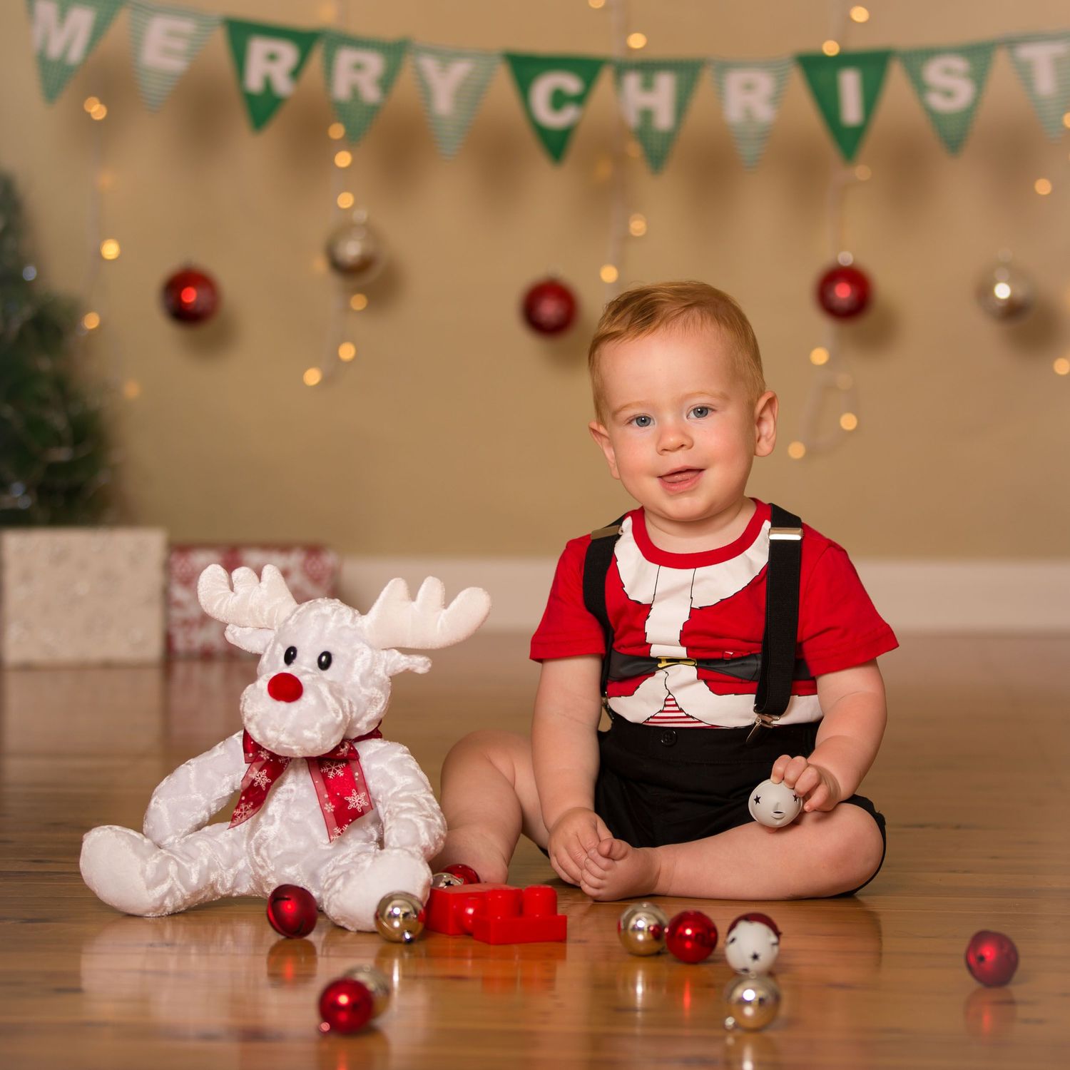 Christmas photo of young boy sitting
