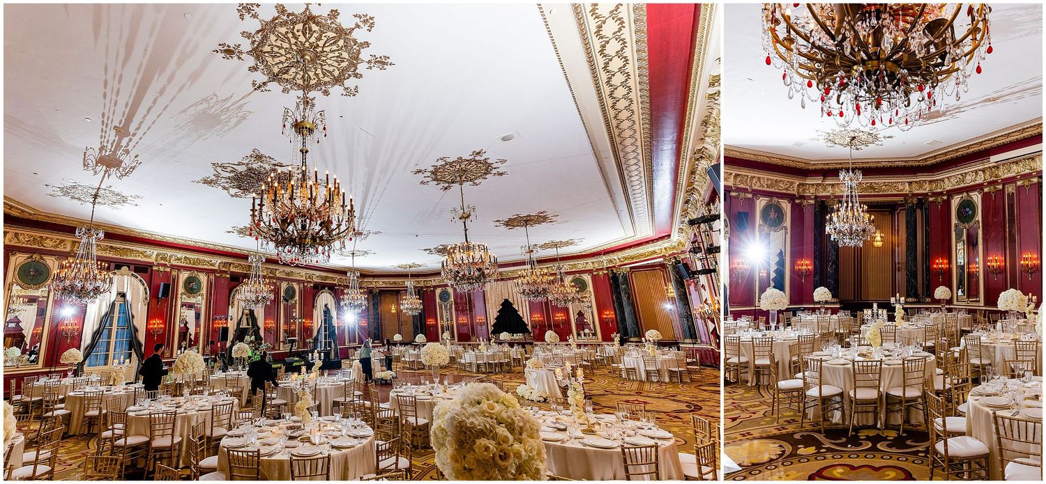 Luxurious wedding reception hall with red walls, gold details, and crystal chandeliers set for formal dining.