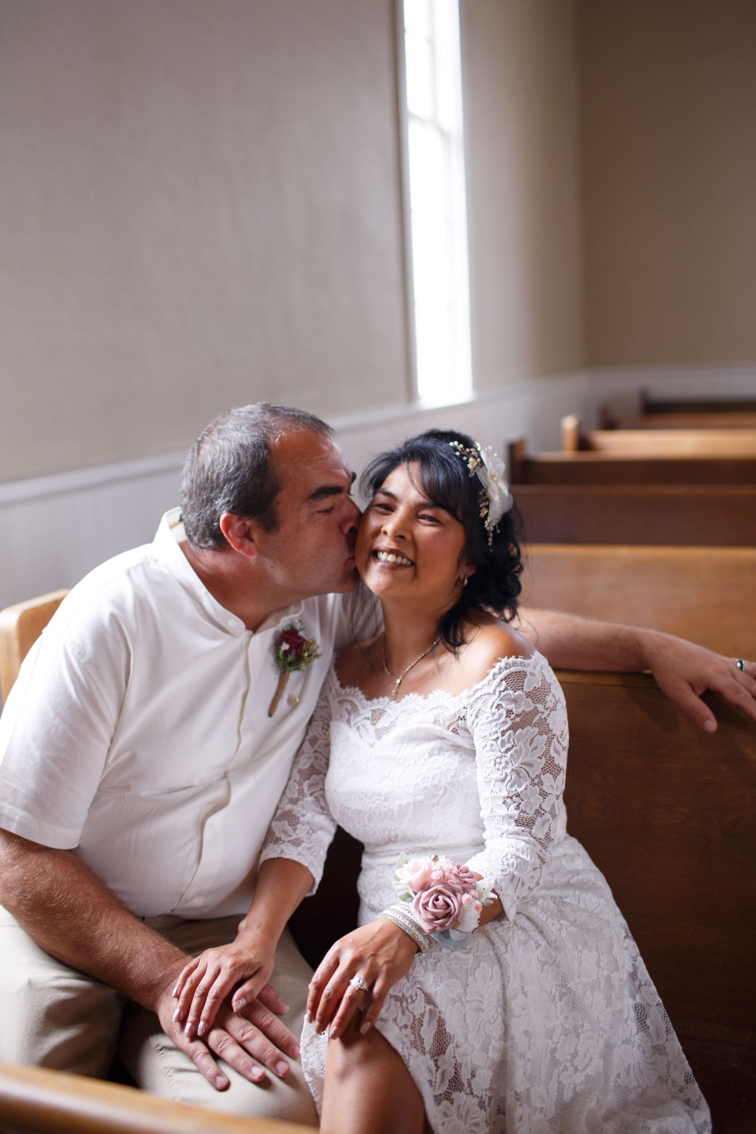 snohomish intimate wedding photographer: a couple sits in Belle Chapel in Snohomish Washington