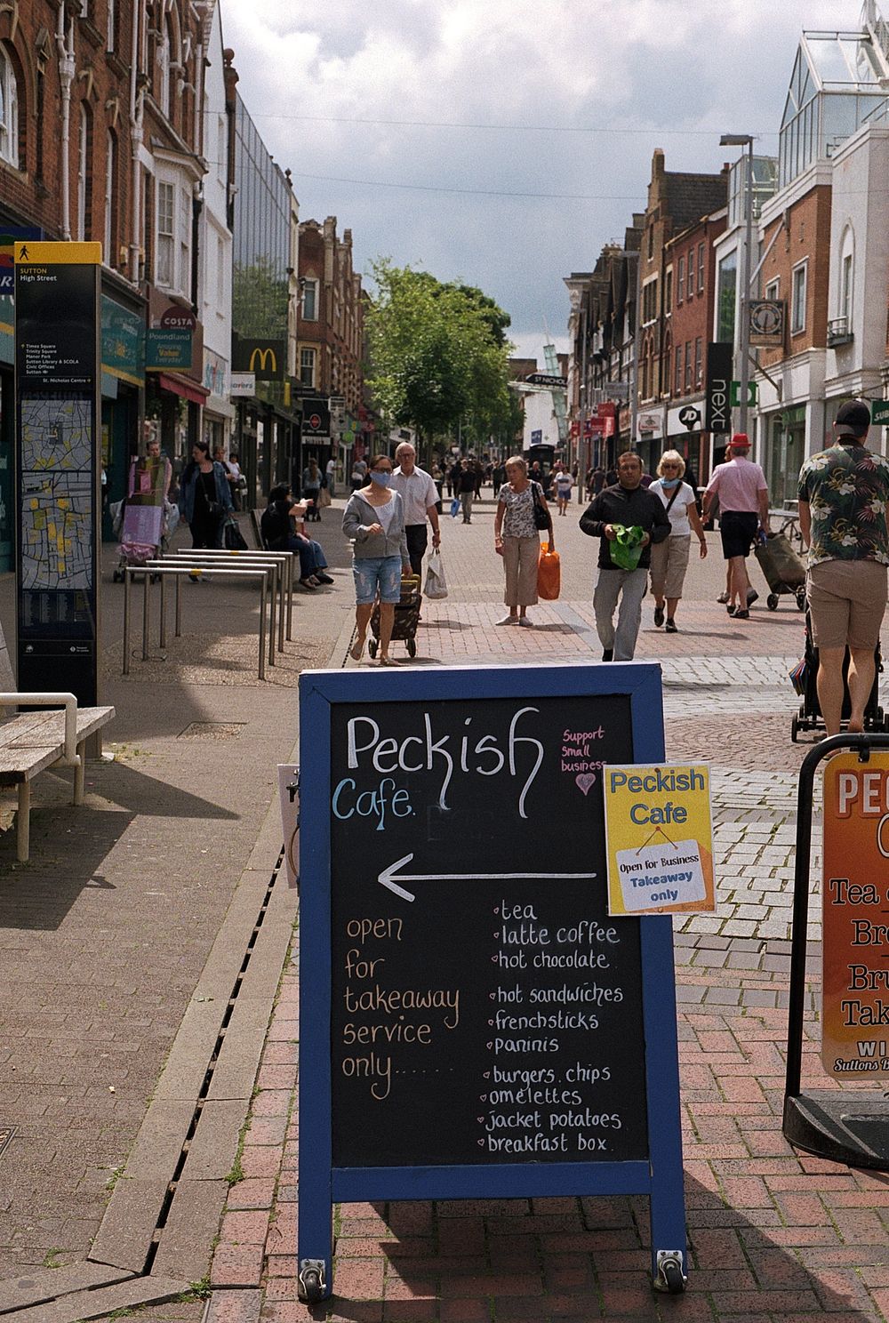 peckish cafe signage