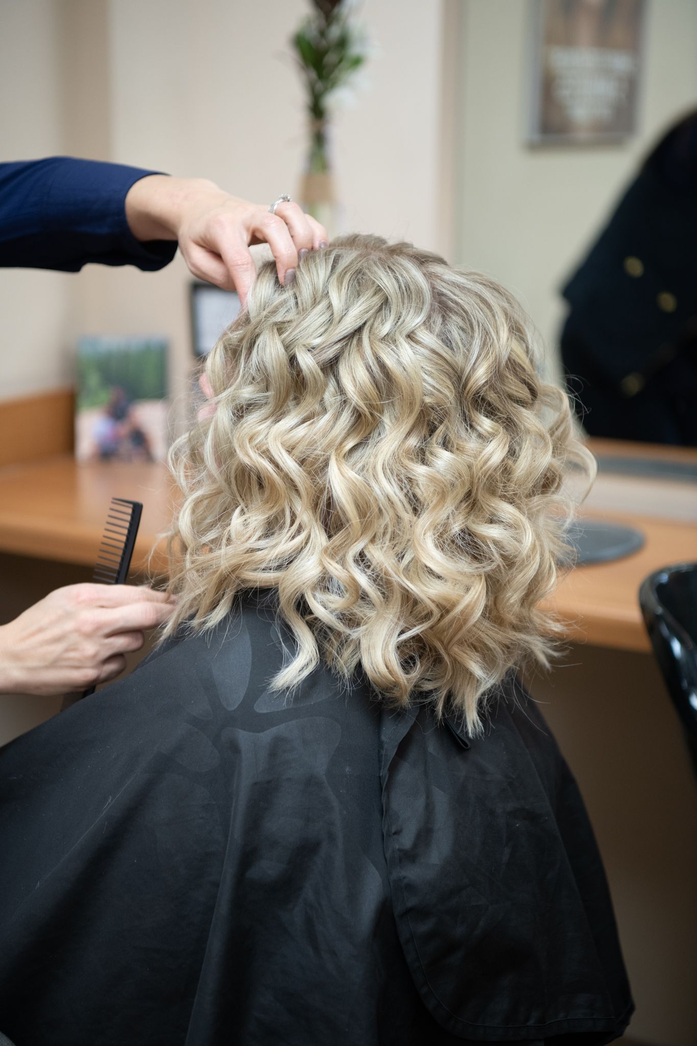 model, Hanna gets hair styled by Jodi Lynn Passow of Lasata Salon for a fashion shoot at Kathleen Murphy Photography