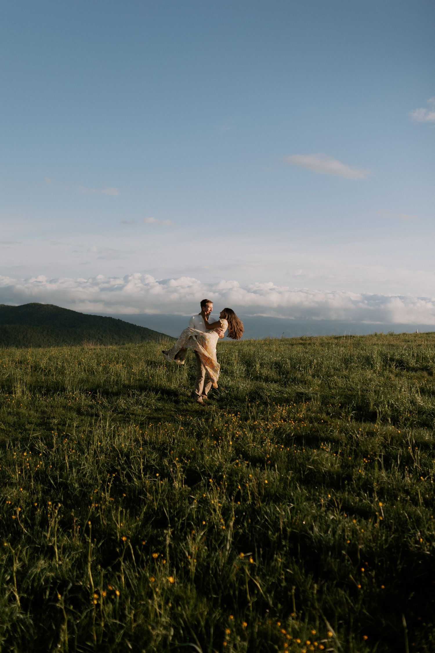 Max patch North Carolina hike sunrise engagement photo Rebekah sage flower dress