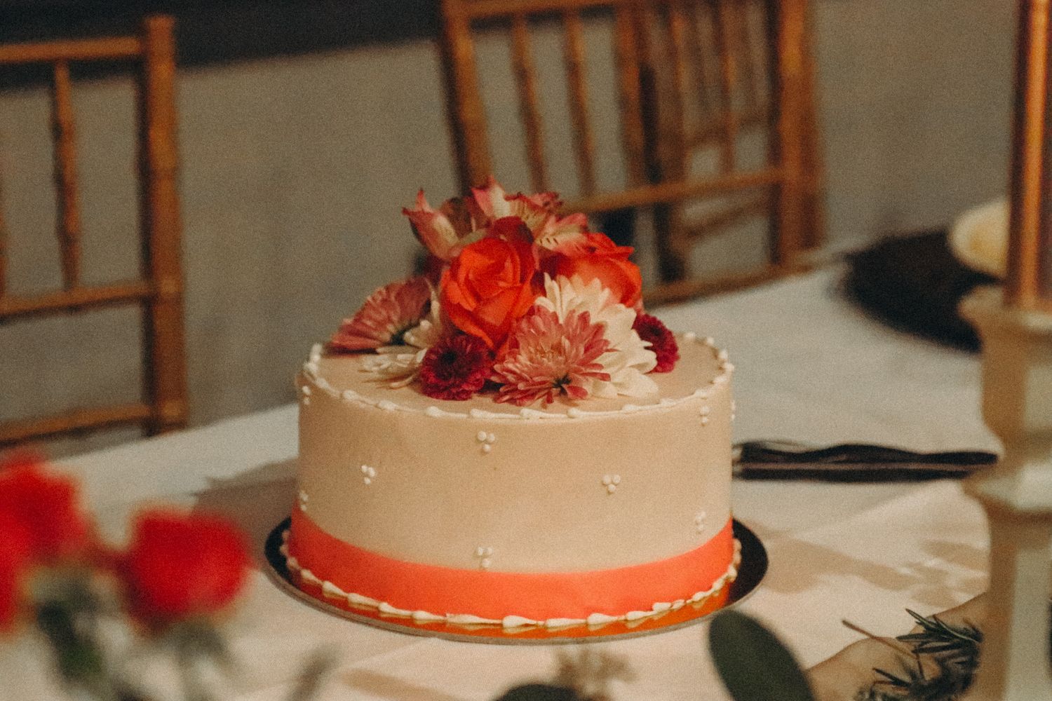 beautiful classy wedding cake groom cake with pearls and ribbon
