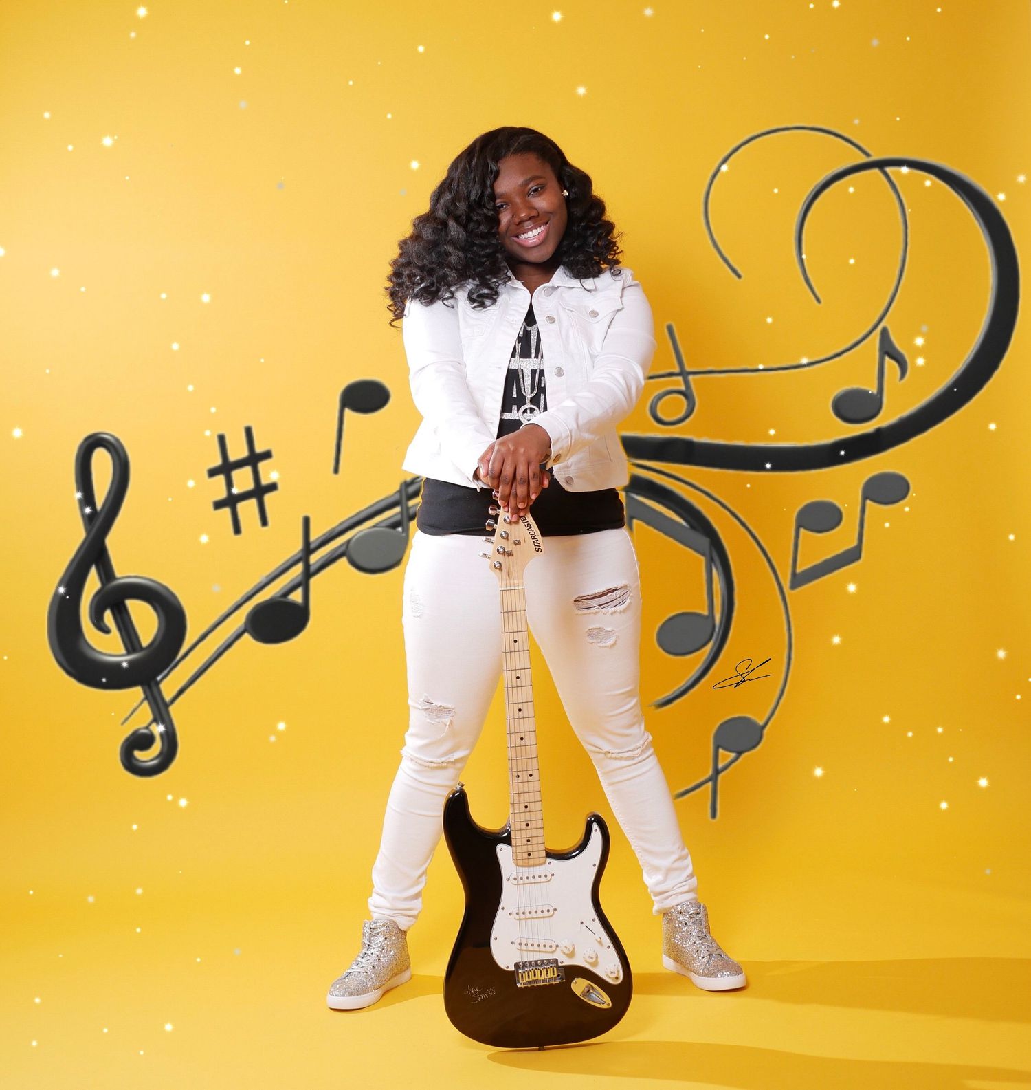 Musician poses with electric guitar against yellow background with decorative music notes.