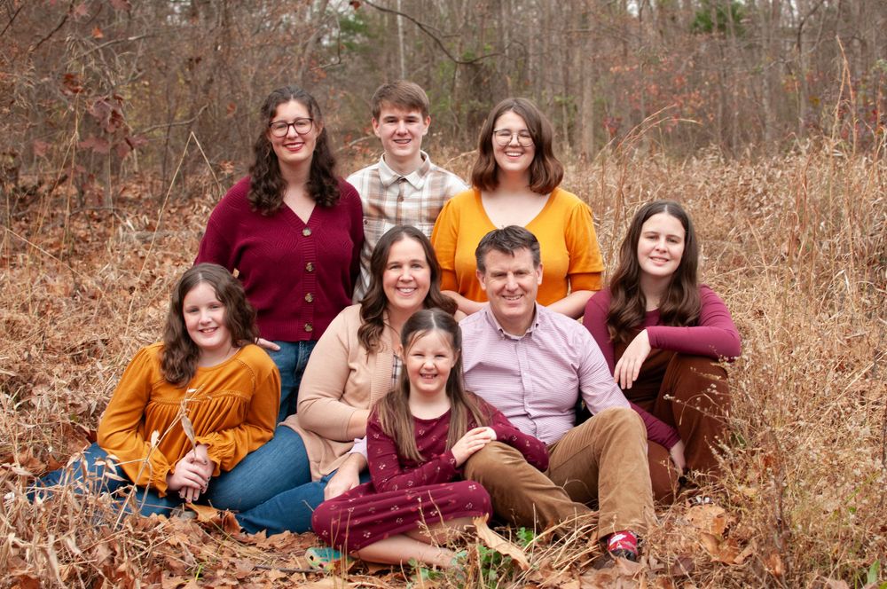 family photo in field fall colors