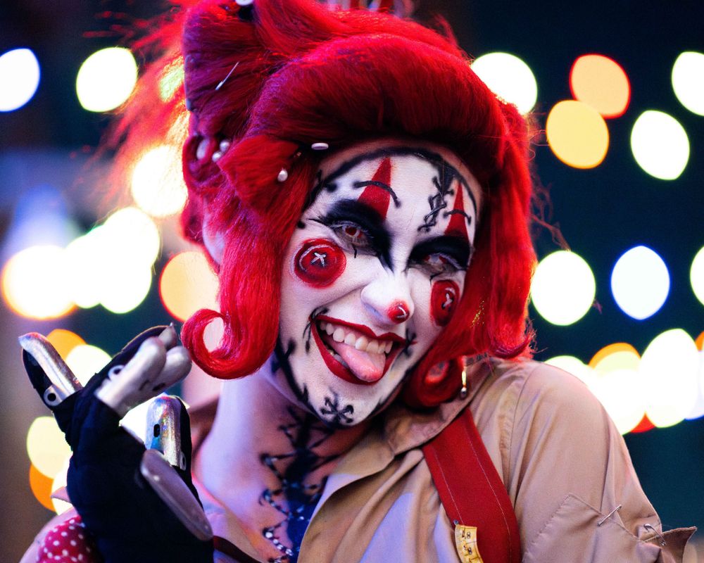 Portrait of a Knott’s Scary Farm monster in full costume and makeup during Halloween season, captured by Chris Cornish Photography.