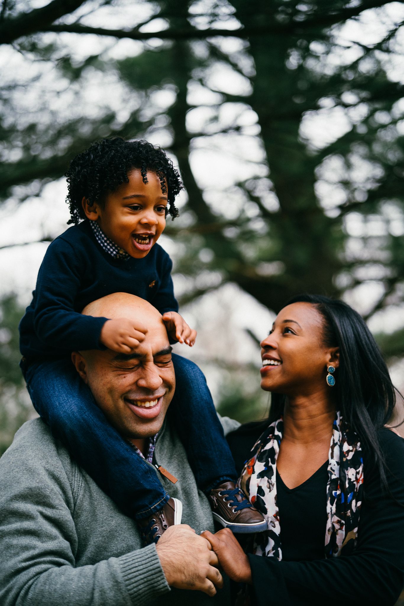 Joyful family moment captured outdoors with natural expressions.