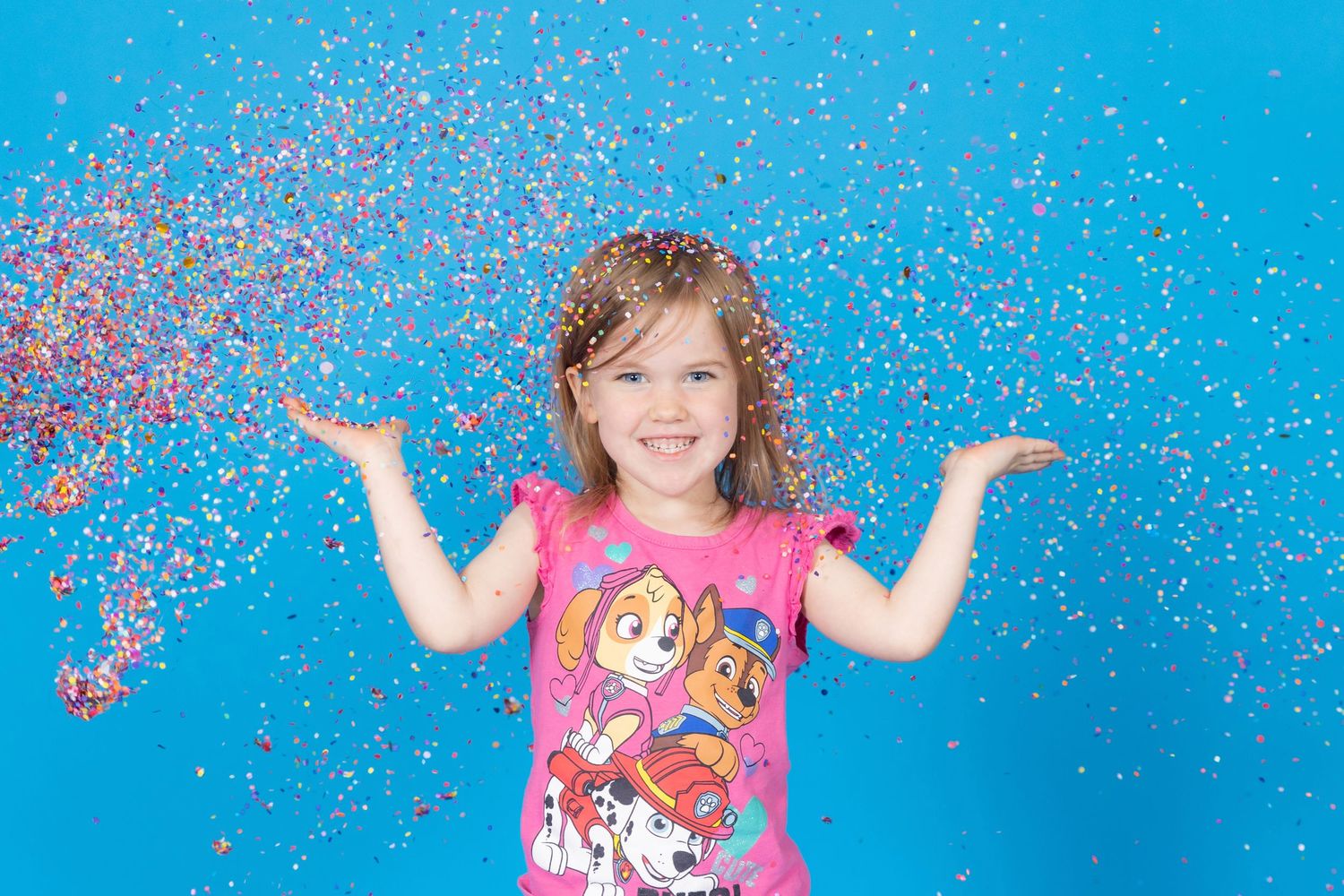 kid on savage blue jay backdrop with confetti in studio in clayton new jersey gloucester