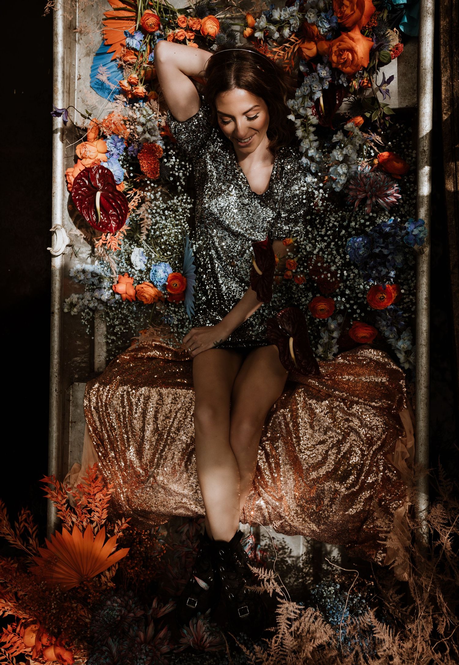 Empowerment photoshoot in boat surrounded by gorgeous florals by Wilde Posies