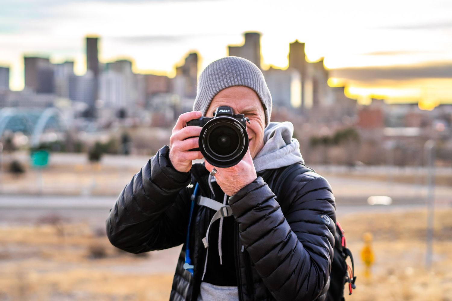 Shot of Denver Drone, Hospitality, Travel & Tourism photographer Captain Colorado Photography aiming his camera right back at you.