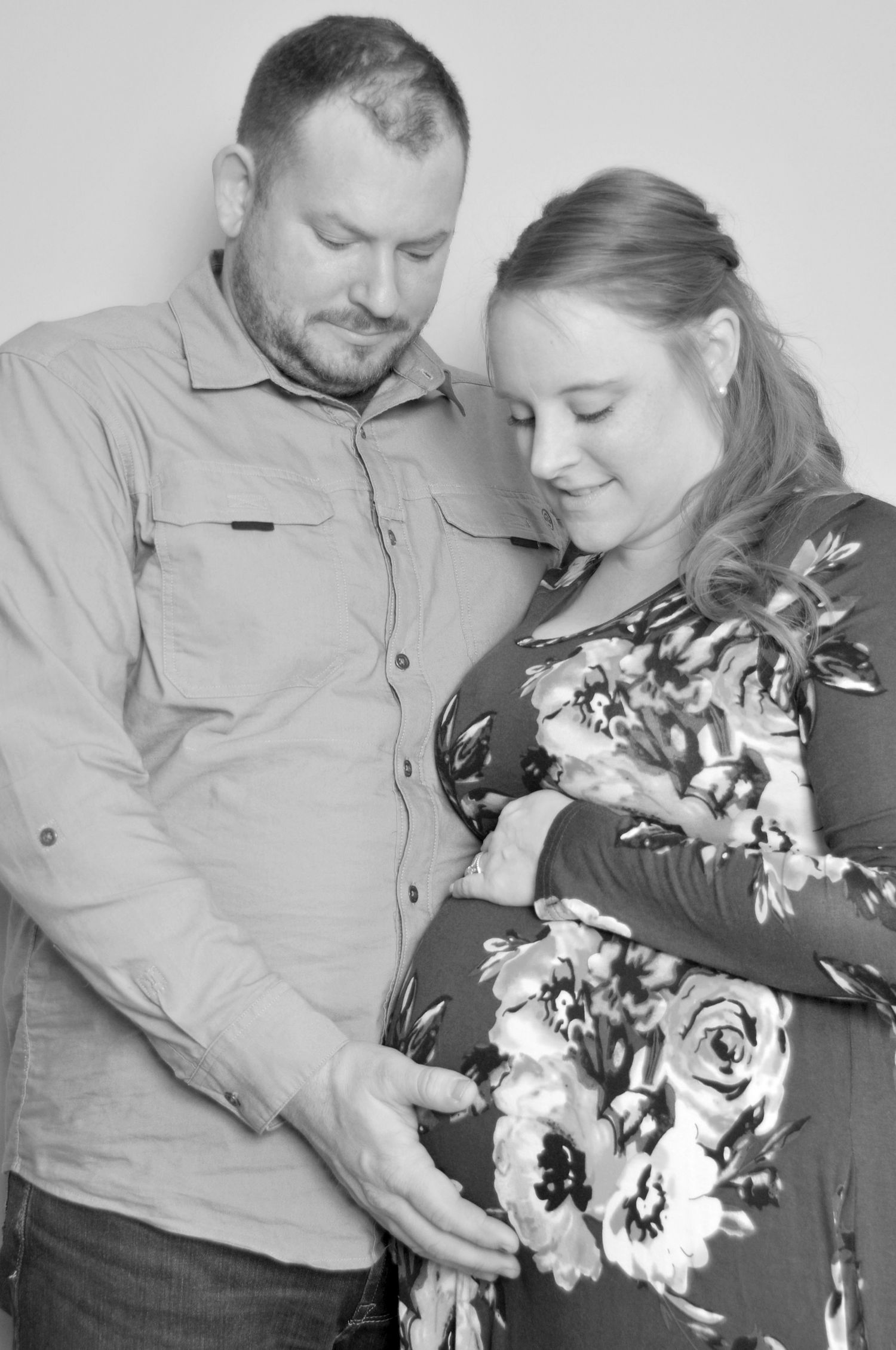 black and white maternity photo parents
