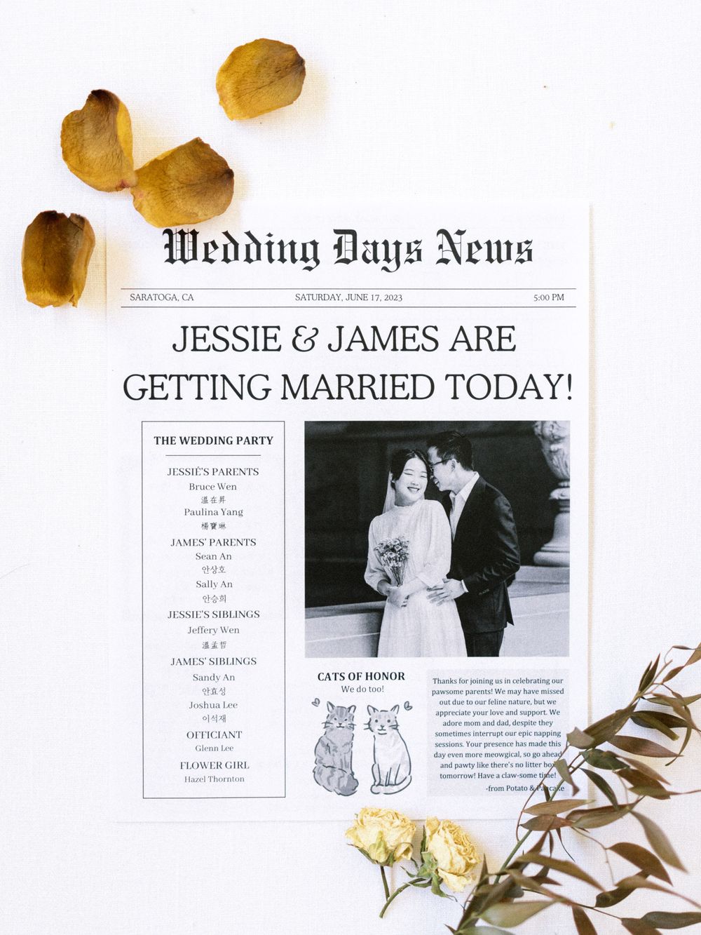 Wedding day newspaper announcement with dried leaves and flowers on white background.