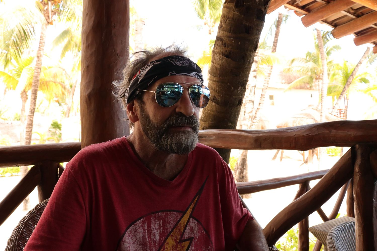 Old gray haired man in a cabanas, Playa del Carmen, Mexico