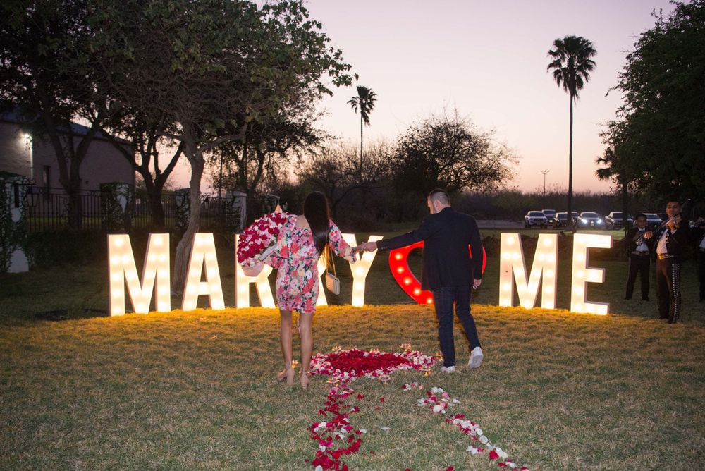 couple getting engaged. marry me letters. Hacienda Las Mariposas. McAllen, Texas. Wedding photographer