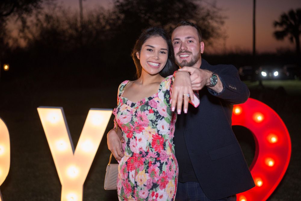 couple showing off the engagement ring. Hacienda Las Mariposas. McAllen, Texas. Wedding photographer