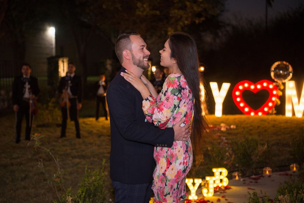 couple posing after being proposed. Hacienda Las Mariposas. McAllen, Texas. Wedding photographer