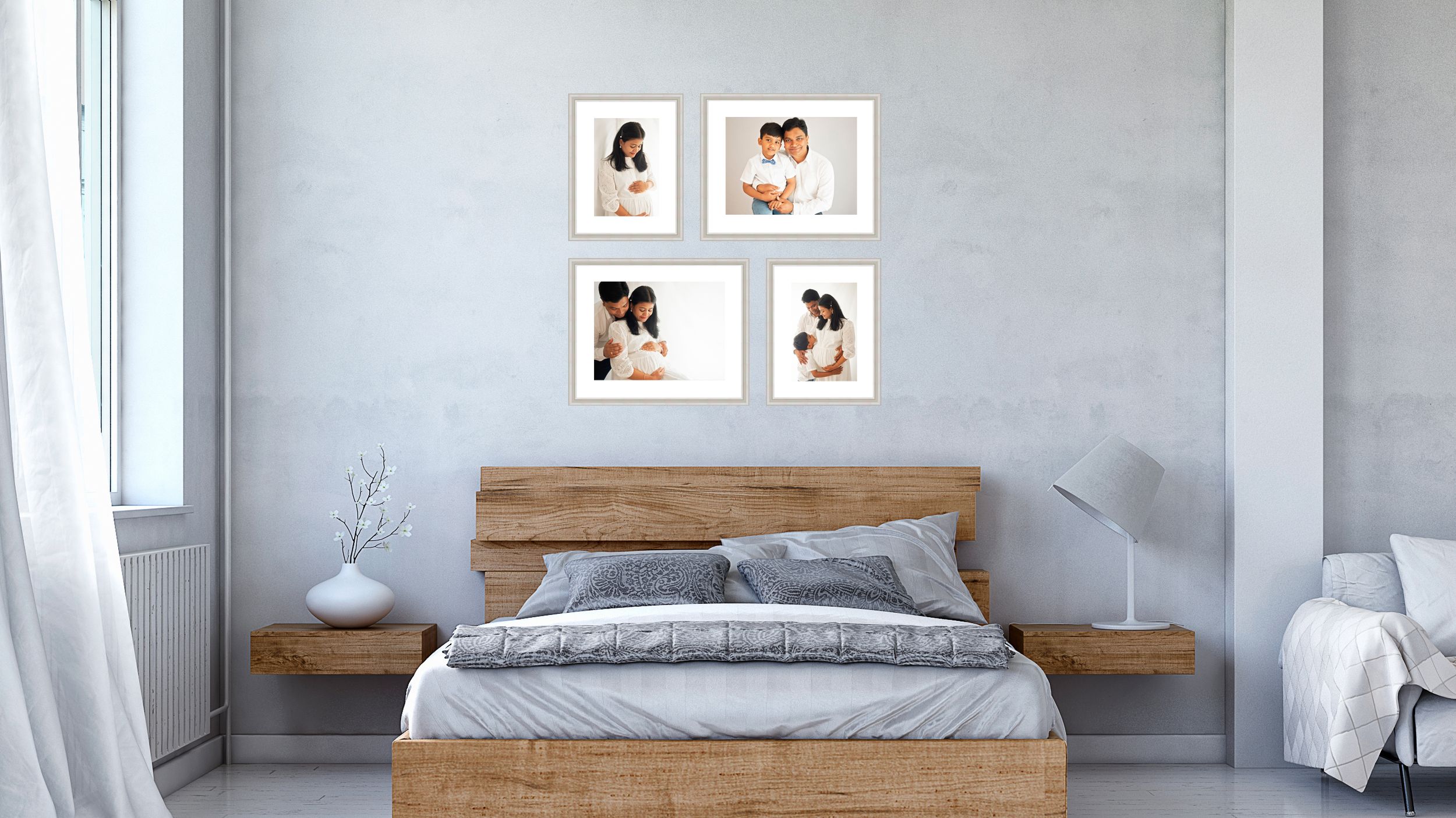 A grouping of four framed photos on a wall above a bed, from a maternity photoshoot in Didcot.