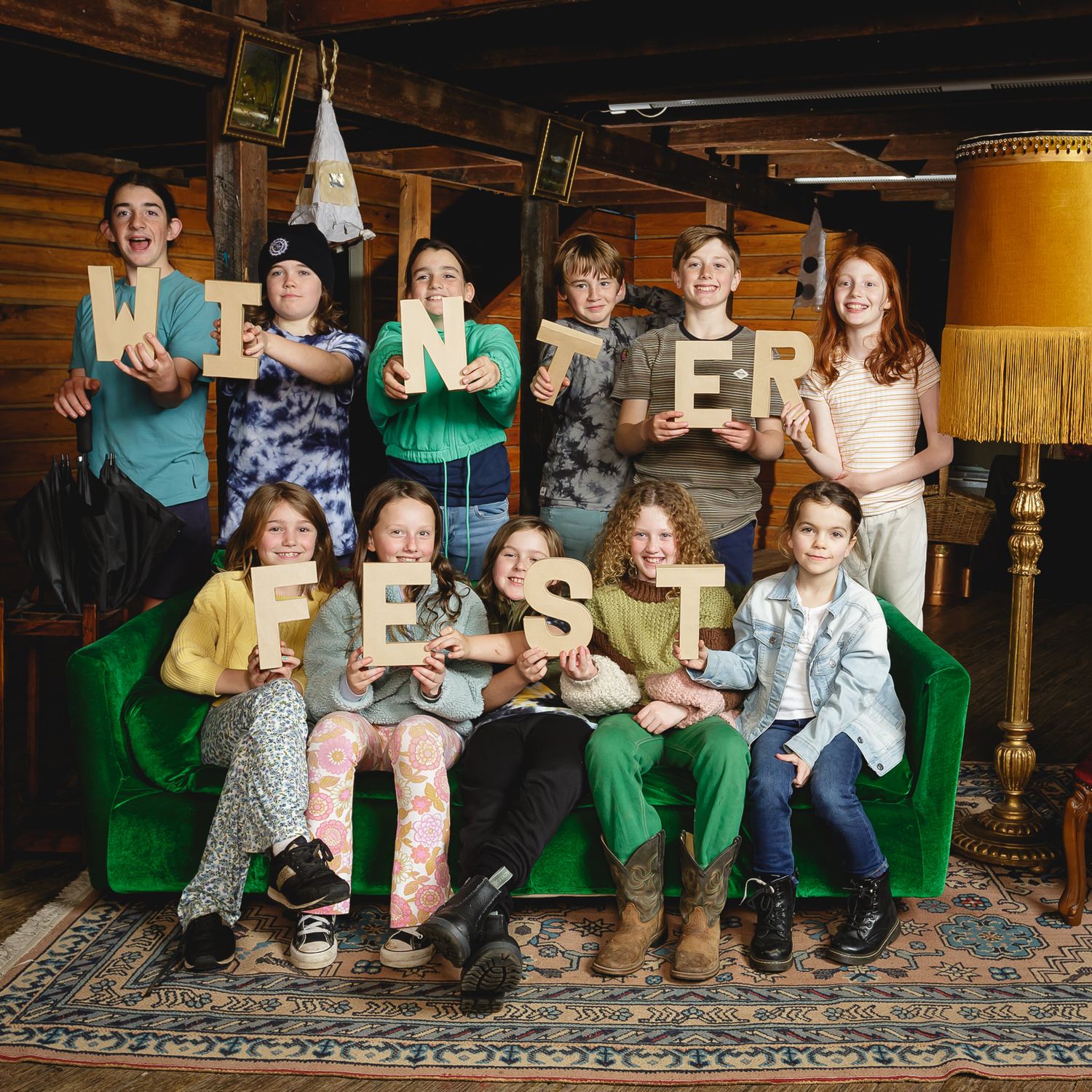 Children hold letters spelling Winterfest