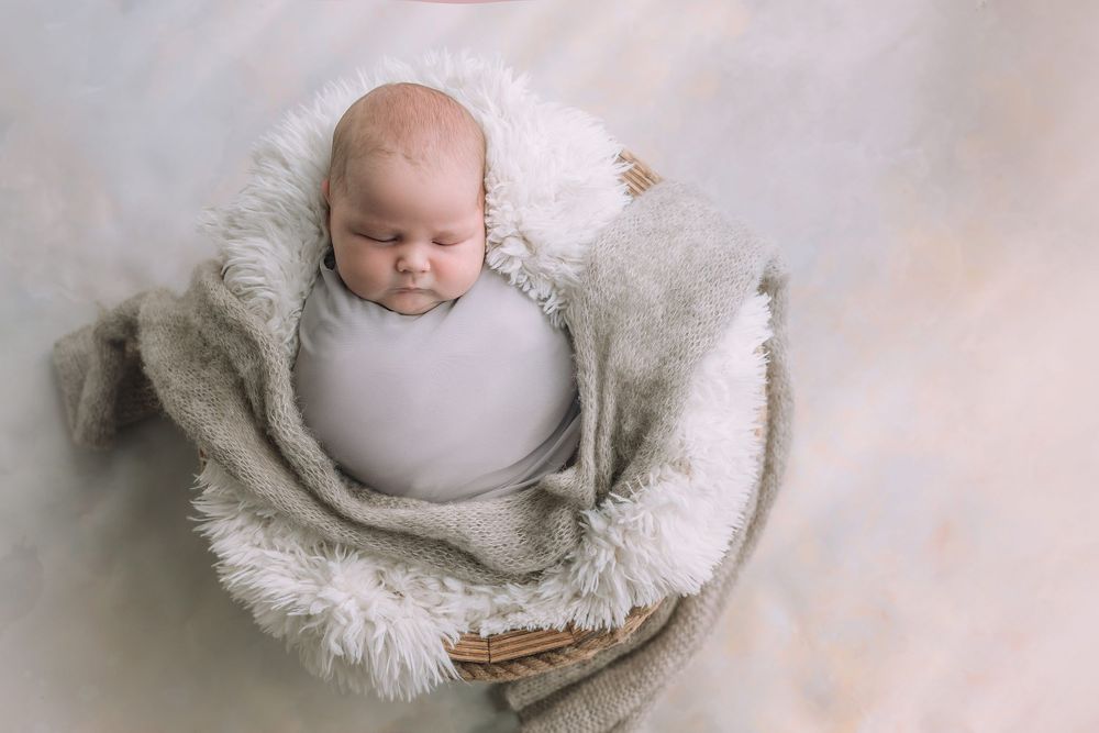 Newborn boy soft colors
